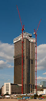 Tower 185 during construction phase on a sunny afternoon.jpg