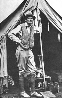 Hiram Bingham III at his tent door near Machu Picchu in 1912.jpg
