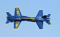 US Navy 040815-N-7559C-001 The lead and opposing solo pilots assigned to the U.S. Navy's flight demonstration team, the Blue Angels, perform the opposing Knife-Edge Pass.jpg