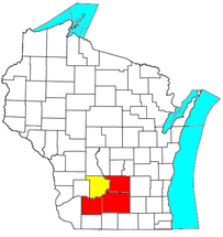 Mapa de Wisconsin con el Área Estadística Metropolitana Combinada de Madison-Baraboo (CSA), compuesta por:      Área Estadística Metropolitana de Madison (MSA)      Área Estadística Micropolitana de Baraboo (µSA)