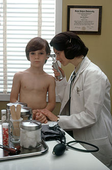 Female doctor examines a child.JPEG