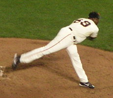 A man standing on a pitching mound wearing a San Francisco Giants' uniform