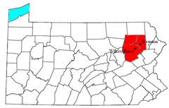 Mapa del área metropolitana en rojo y el área estadística combinada el condado en amarillo