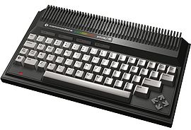 Commodore Plus/4. Note the four arrow-shaped keys forming the cursor key "diamond" to the right.