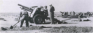 Captured 25-pdrs howitzers in Africa Corps service.jpg