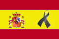 Bandera de España con lazo de solidaridad con las víctimas